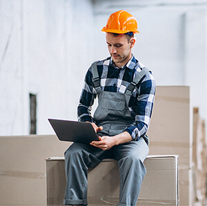 Logistics professional reviewing shipment documentation